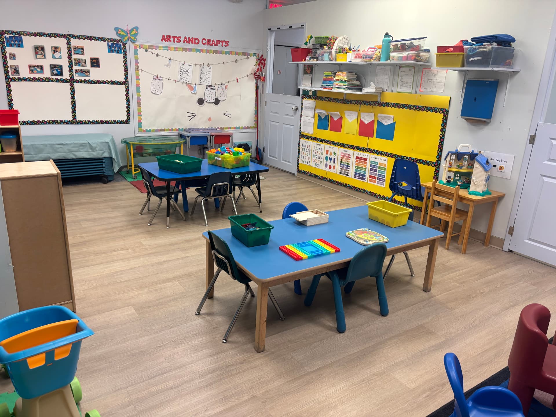 The Arts and Crafts wall and our blue work tables